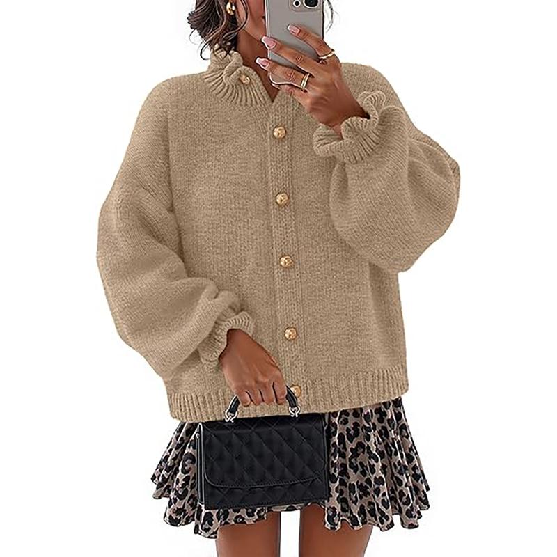 Relaxed fit knit cardigan sweater for women with prominent buttons, great as a cozy top.
