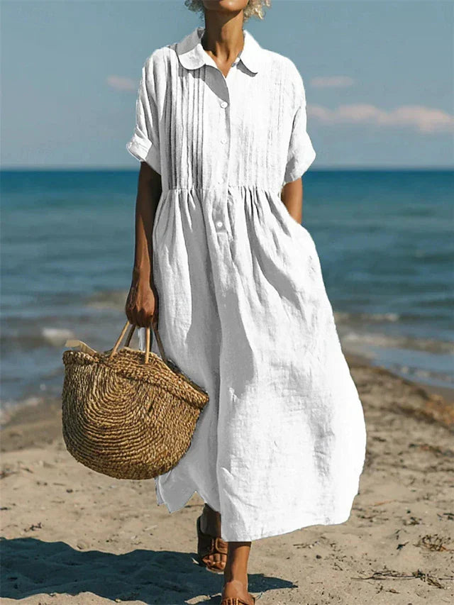 Women's button-front maxi shirt dress in a flowy fabric, perfect for effortless spring & summer style.