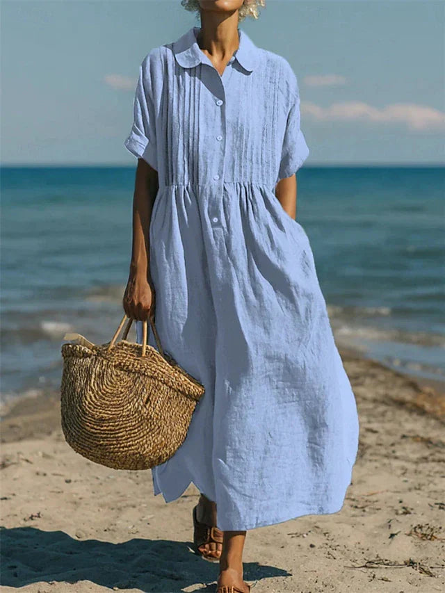 Versatile women's maxi shirt dress with button-front closure, ideal for casual wear or elegant resort style.