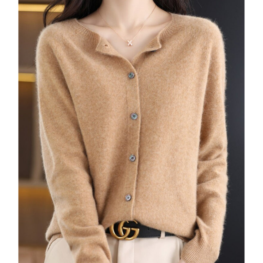Women's comfortable knit cardigan. O-neck, long sleeve, button front. Ideal for versatile office wear.