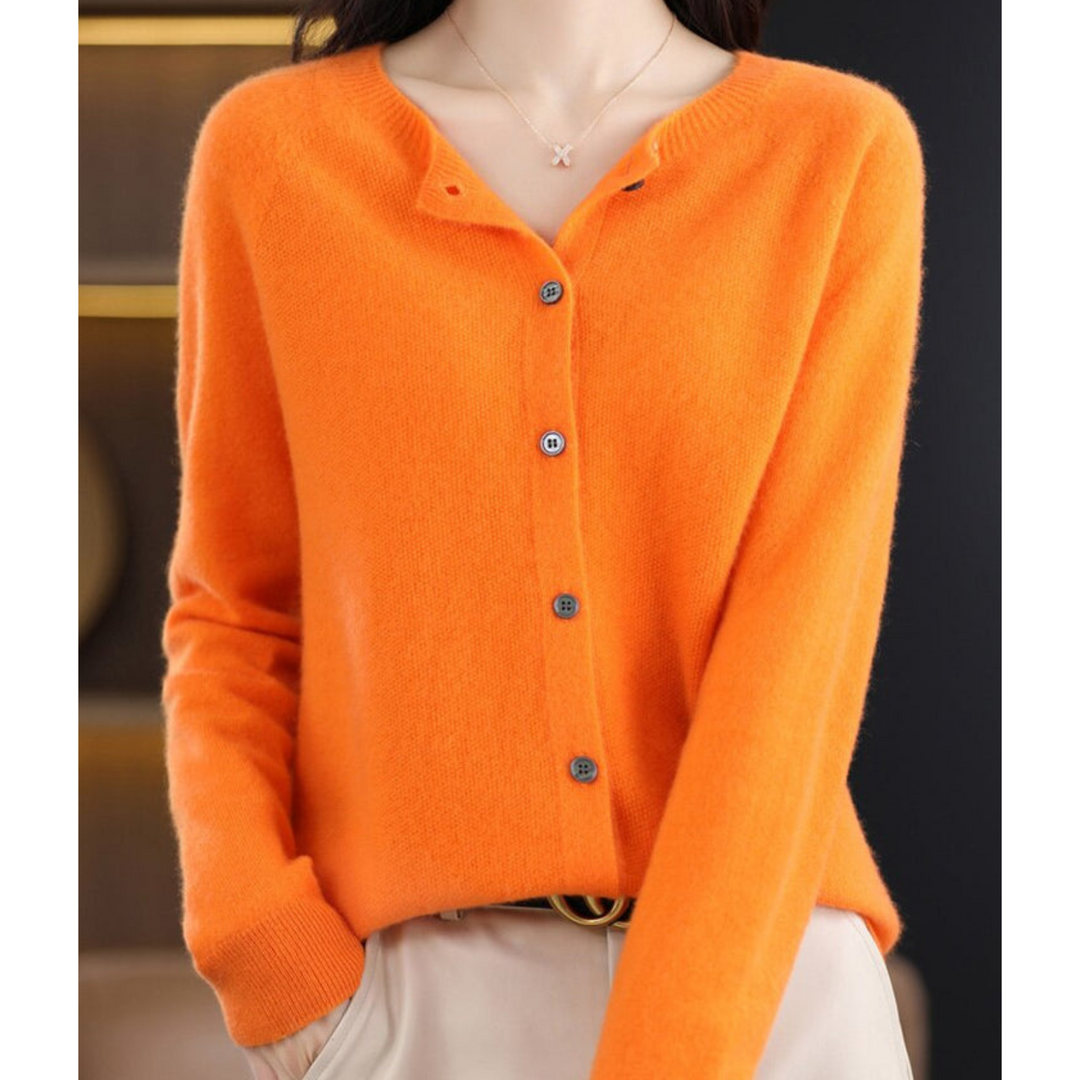 Cozy women's knit cardigan, O-neck & button front design. A stylish long sleeve for fall/winter.