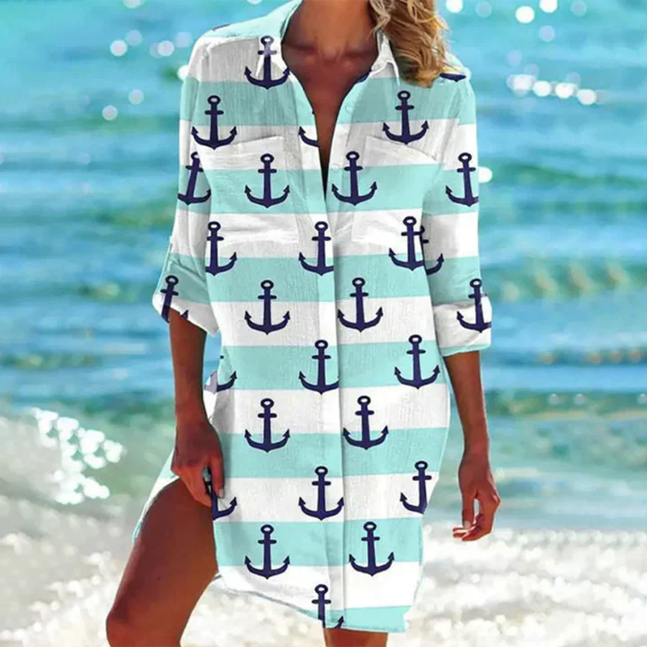 Chic women's button-up mini dress with a collared neckline. Flattering short design for summer fashion.