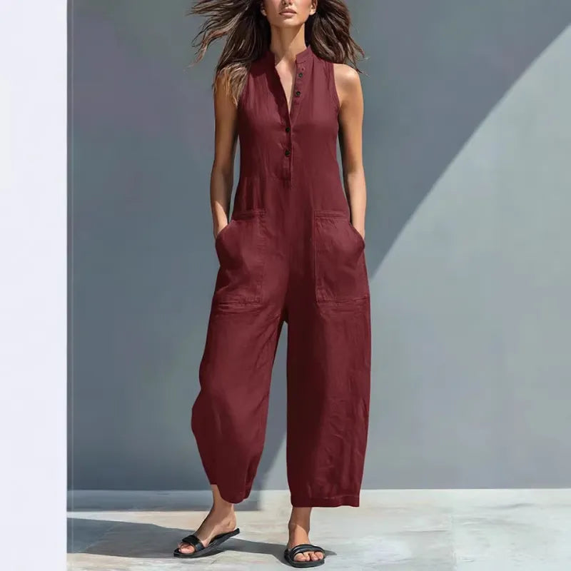 Modern women's sleeveless button-up jumpsuit with a stand collar; a versatile casual one-piece.