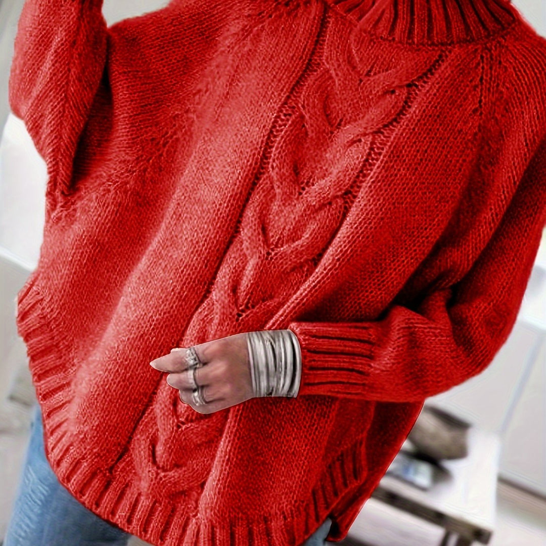 Fashionable high-neck cable knit women's sweater with a flattering flared hem. Ideal for fall comfort.