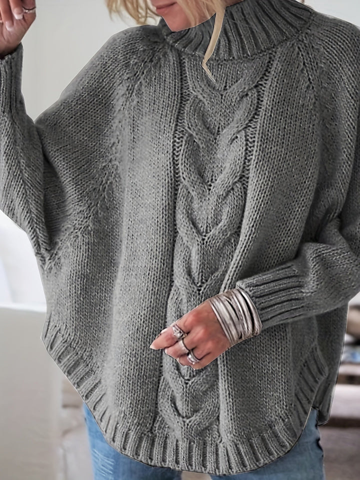 Cozy women's cable knit sweater, high neck, flared hem. A must-have for fall & winter casual wear.