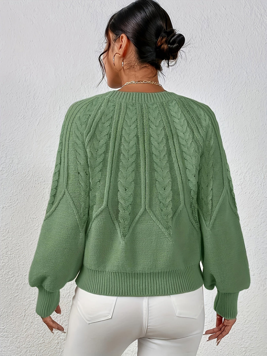 Women's cable knit sweater, relaxed fit, lantern sleeves. Cozy fall fashion pullover.