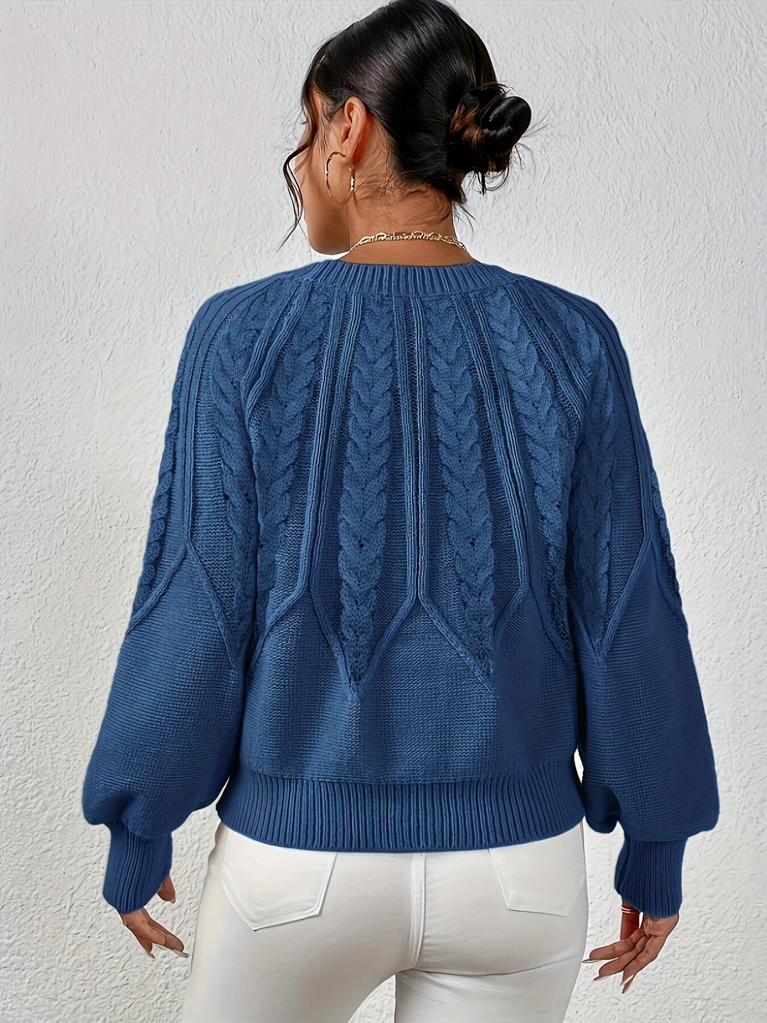 Stylish women's pullover, cable knit, relaxed fit, lantern sleeves, fall fashion.