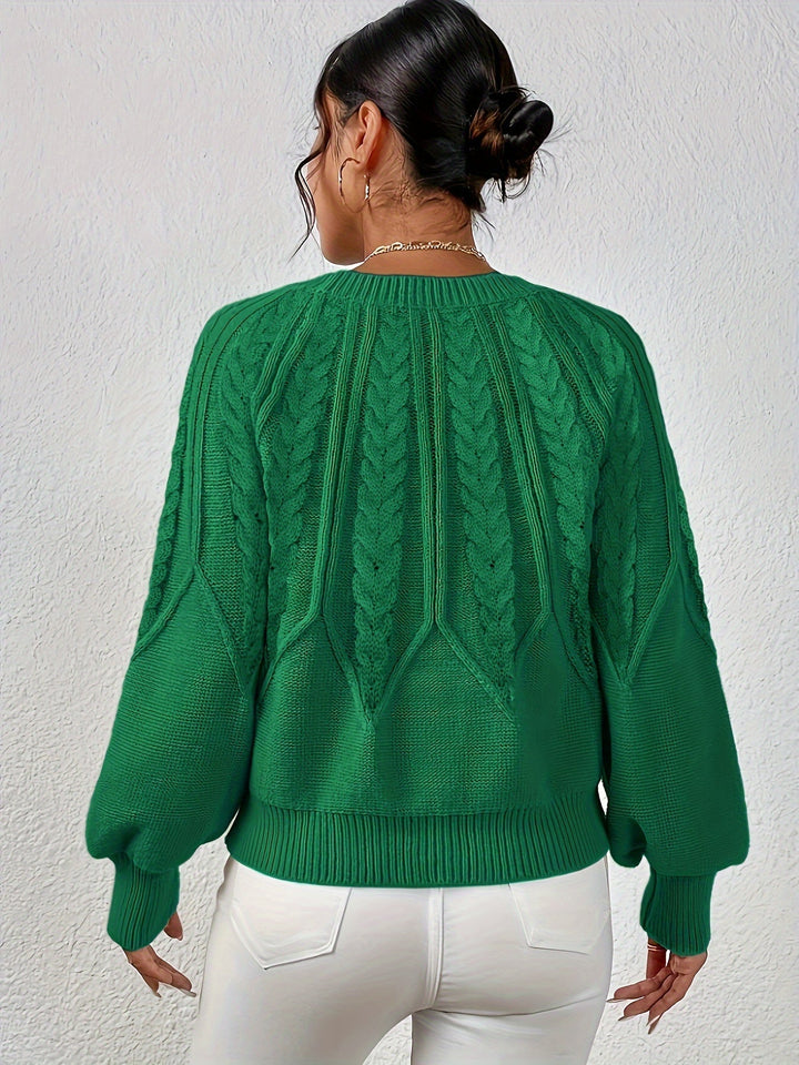 Fall/winter women's cable knit sweater, relaxed fit, warm lantern sleeve design.