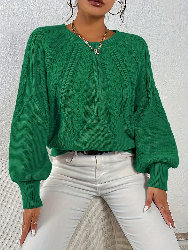 Relaxed fit women's cable knit sweater, a versatile and stylish everyday top.