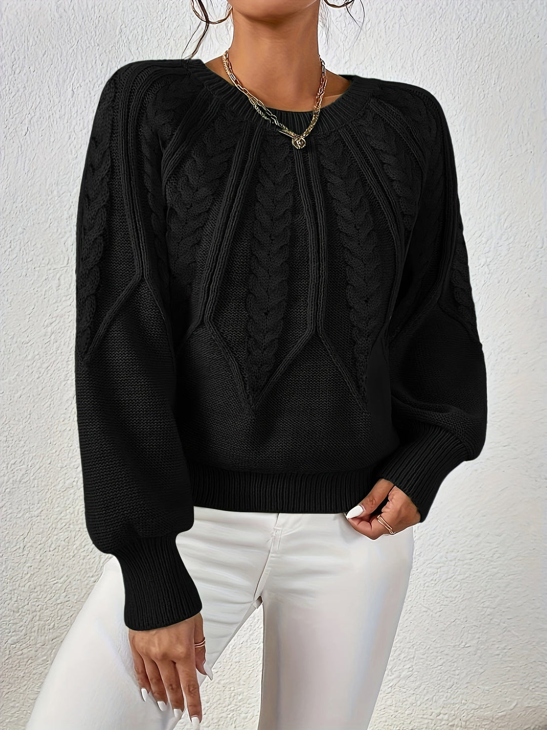 Cozy fall sweater for women, cable knit, relaxed fit, chic lantern sleeves.
