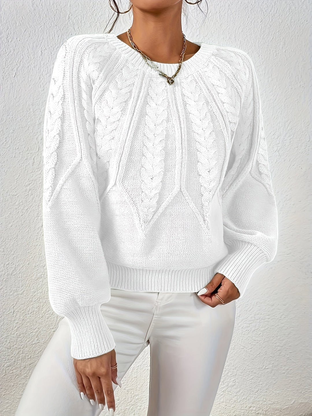 Cozy women's top, cable knit texture, relaxed fit, lantern sleeves, fall look.