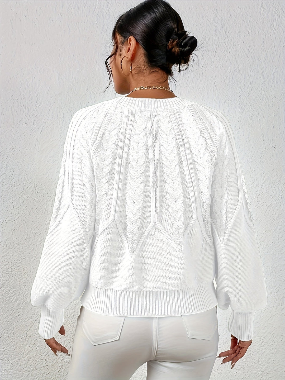 Women's casual cable knit sweater, relaxed fit, lantern sleeves, easy styling.