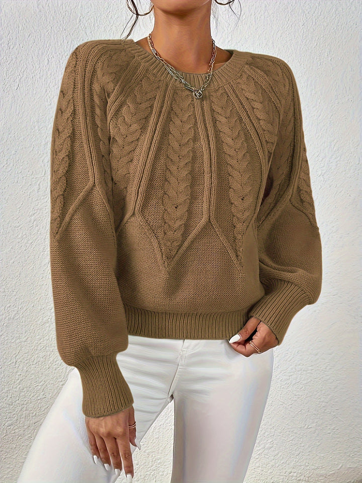 Cozy women's knit top, cable pattern, relaxed fit, elegant lantern sleeves.