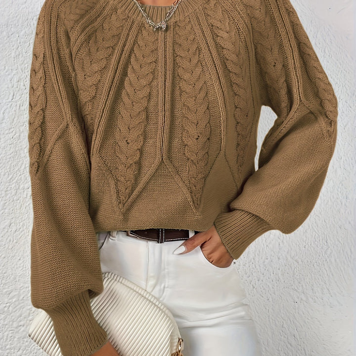 Women's chic cable knit sweater, relaxed fit, lantern sleeves, for modern everyday style.