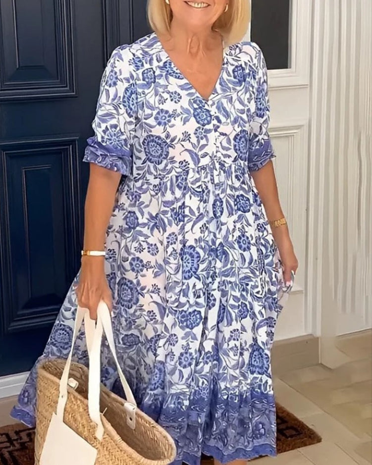 Elegant women's floral A-line dress with V-neck, ideal for spring parties or everyday comfort.