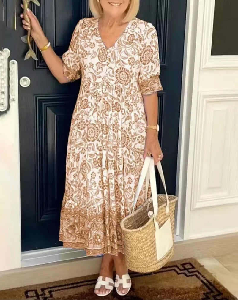 Full-length view of a Women's Capri Floral V-Neck A-Line Dress, a chic addition to spring wardrobe.
