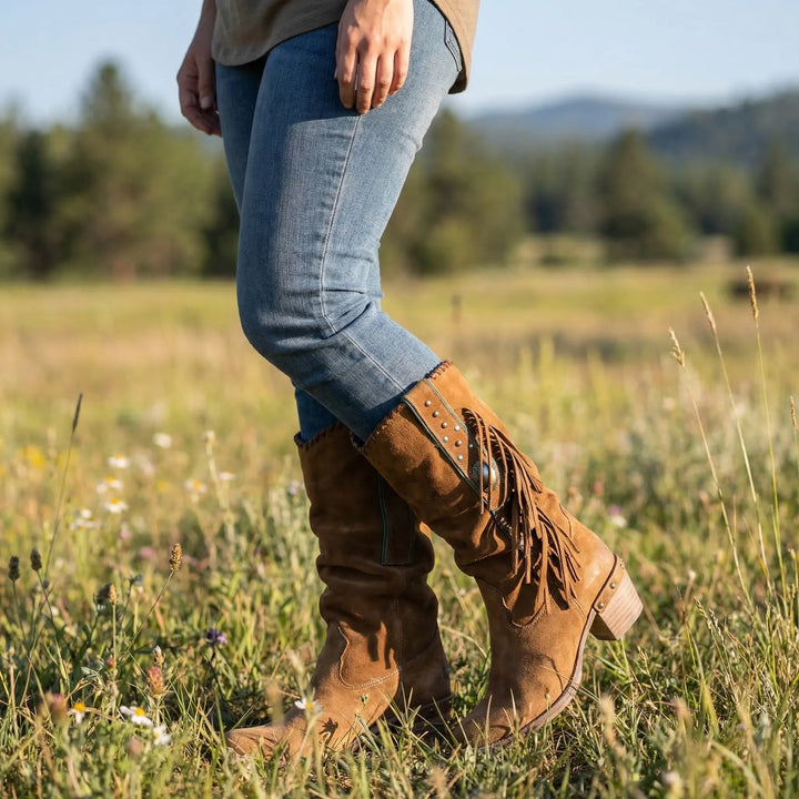 Women's Caroline mid-calf western boots with fringe, pointed toe, and block heel.