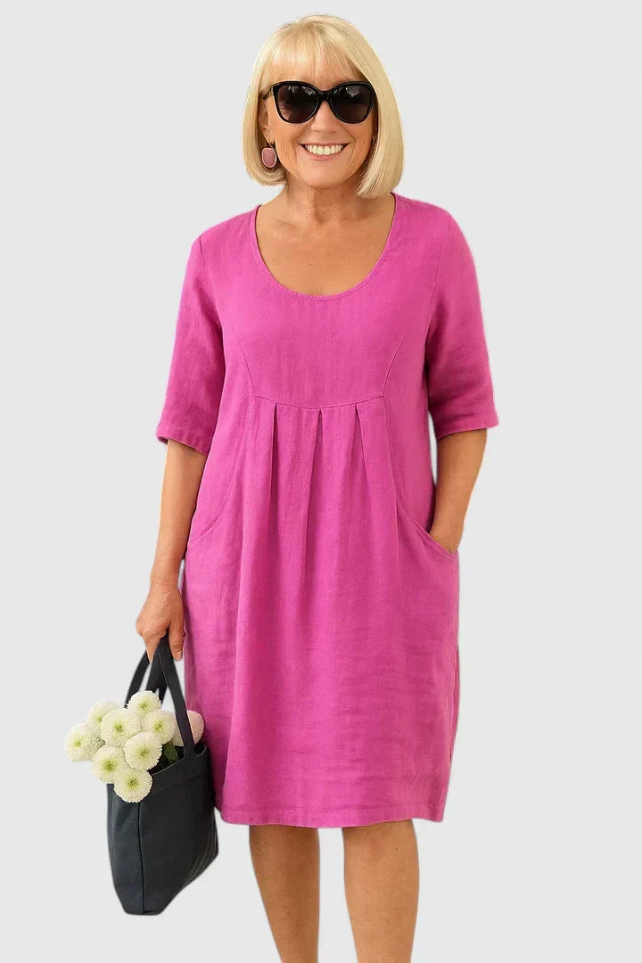 Stylish women's A-line summer midi dress. Casual, comfortable, with pockets. Perfect for warm weather.