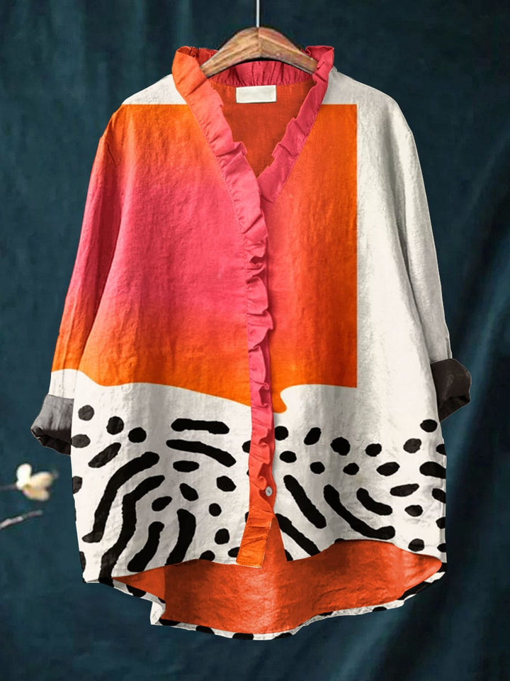 Women's casual abstract block print blouse with ruffled collar and long sleeves for a stylish look.