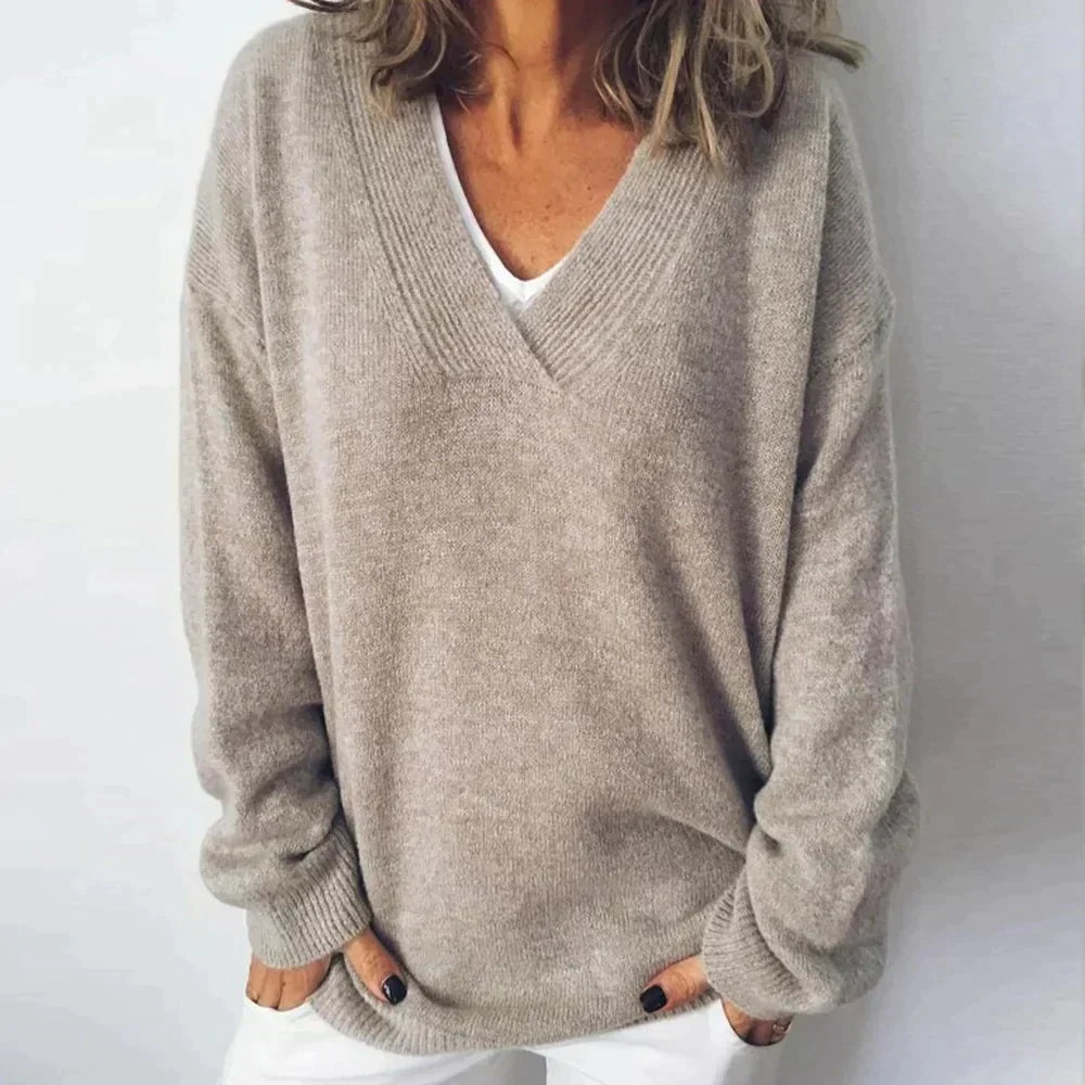 Women's casual beige V-neck long sleeve sweater. Relaxed fit, comfortable & stylish everyday wear.