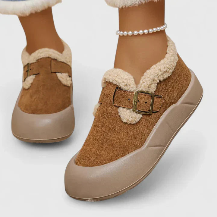 Close-up of the buckle detail on comfortable women's casual slip-on shoes, great for daily use.