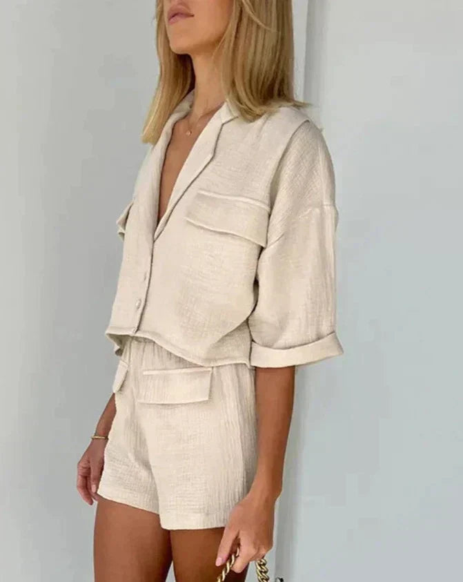 Comfortable women's casual shorts set with a button-down shirt, great for lounging, vacation, or summer fashion.