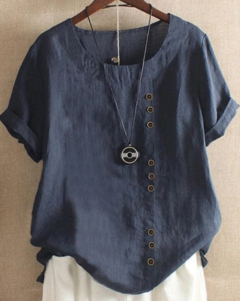 Relaxed fit women's casual button-front tunic, comfortable short-sleeve top for spring & summer fashion.