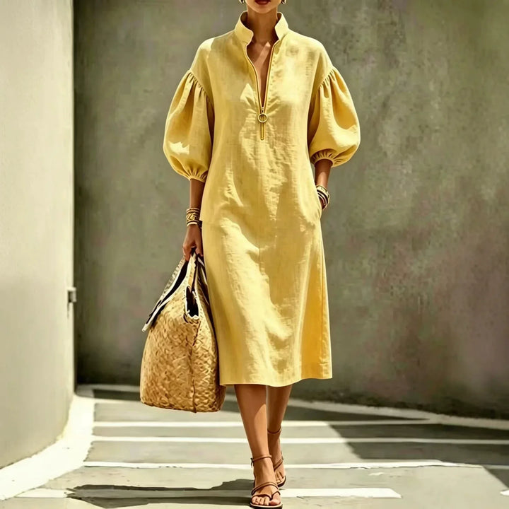 Comfortable women's casual midi dress featuring trendy bubble sleeves, half-zip stand collar, ideal for everyday chic.