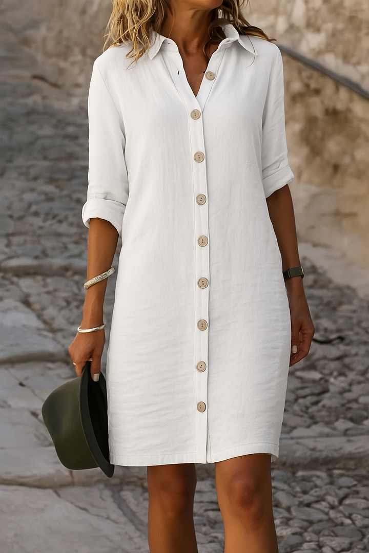 Elegant casual women's dress, collared, with roll tab sleeves, ideal for summer days.