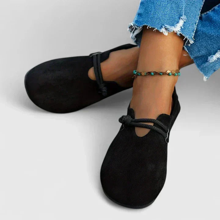 Comfortable women's loafers with a unique rope tie detail, flat sole & easy slip-on style for casual outfits.