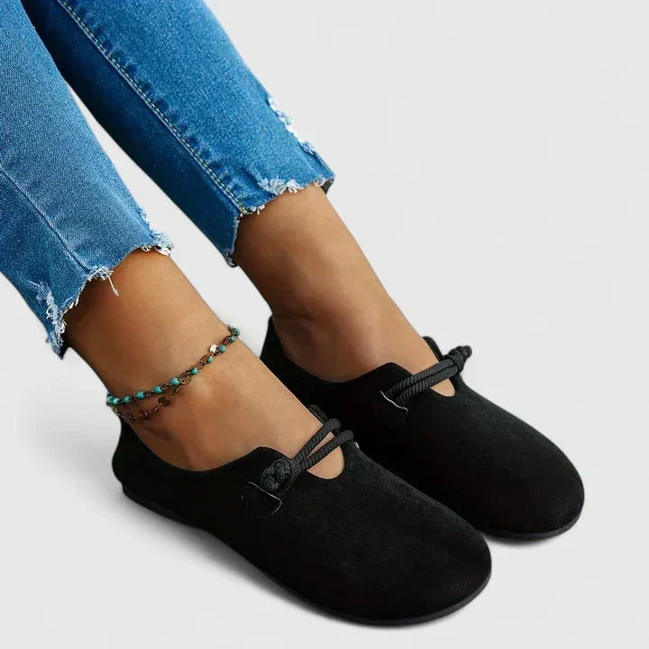 Everyday women's casual flats featuring a comfortable slip-on design, flat sole, and chic rope tie details.