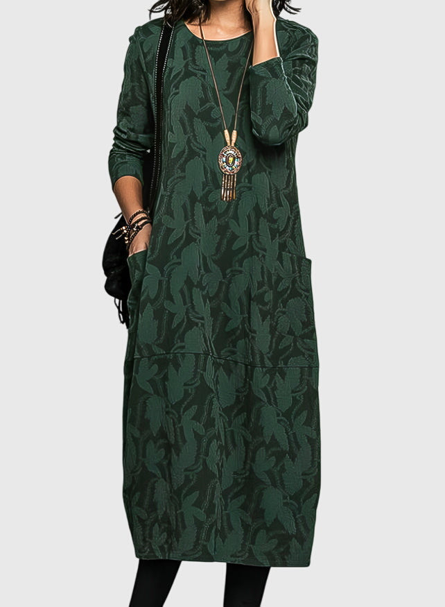 Women's casual floral pattern midi dress with convenient pockets. Ideal for comfortable fall and winter everyday wear.