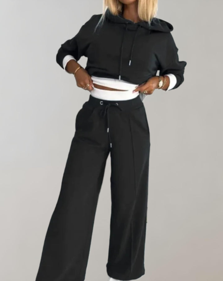 Women's casual gray hoodie and matching tracksuit set, perfect for comfortable everyday loungewear.