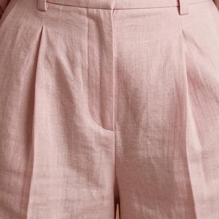 Effortless summer fashion: women's long-sleeve top & high-waist shorts two-piece casual set.