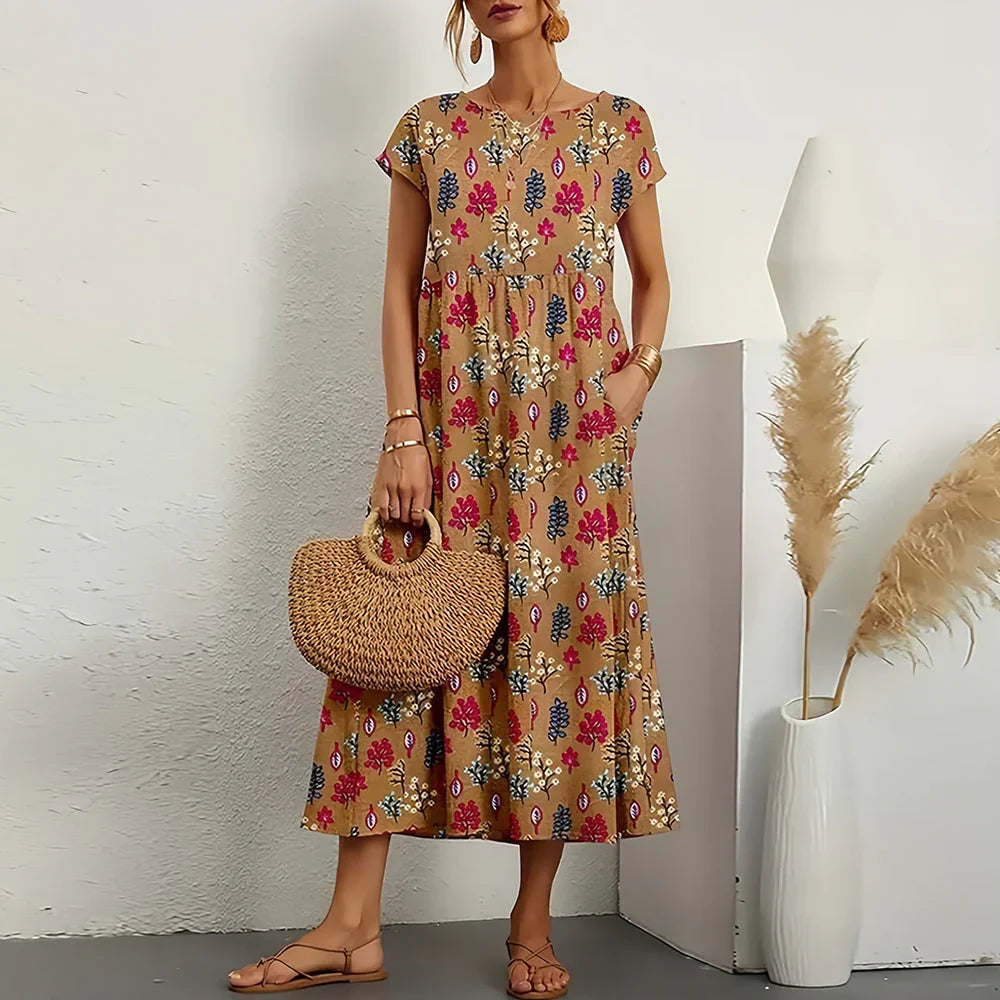 Women's casual midi dress with comfortable cap sleeves, perfect for everyday summer wear.