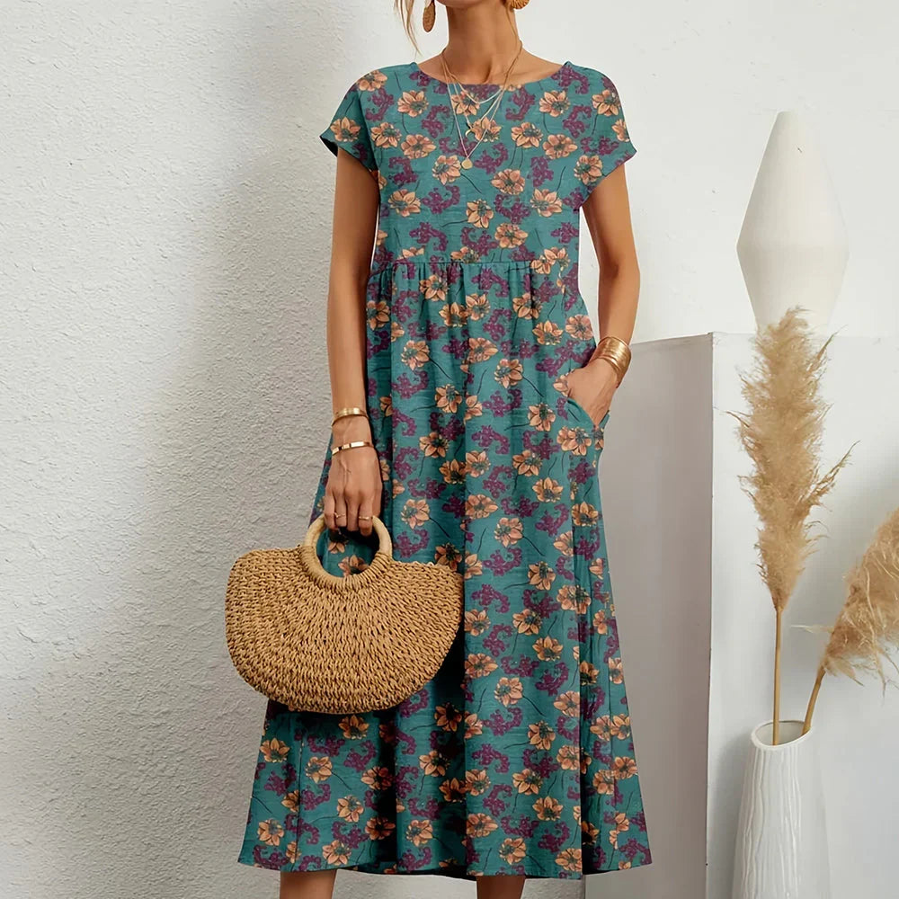 Versatile women's day midi dress with cap sleeves, ideal for comfortable everyday wear in warm weather.