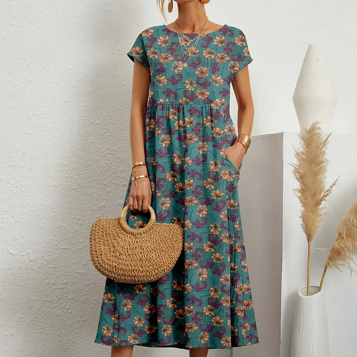 Versatile women's day midi dress with cap sleeves, ideal for comfortable everyday wear in warm weather.
