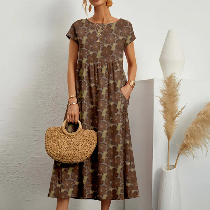 Comfortable women's casual midi dress featuring cap sleeves, a flowing design for summer and spring fashion.