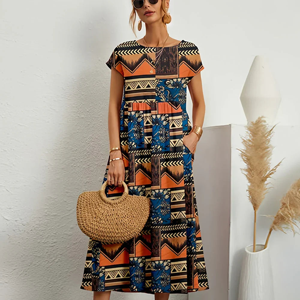 Flowing women's casual midi dress with cap sleeves, a perfect chic option for warm weather and everyday style.