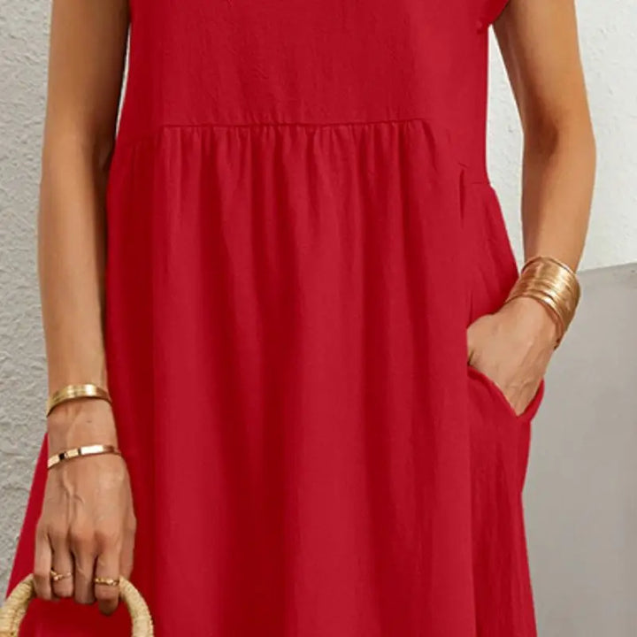 Burgundy women's casual midi dress, short sleeve, with practical pockets for everyday comfort.