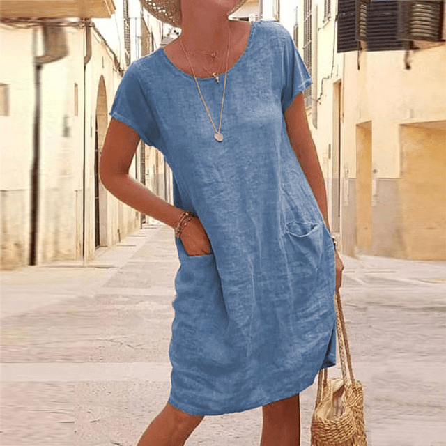 Versatile women's mini dress, relaxed fit, short sleeve, with functional pockets. Perfect for casual everyday wear.