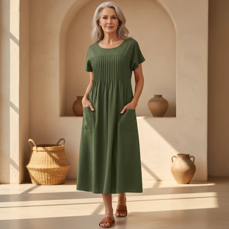 Women's casual relaxed midi dress in a comfortable fit with pleats & pockets, perfect for everyday summer wear.
