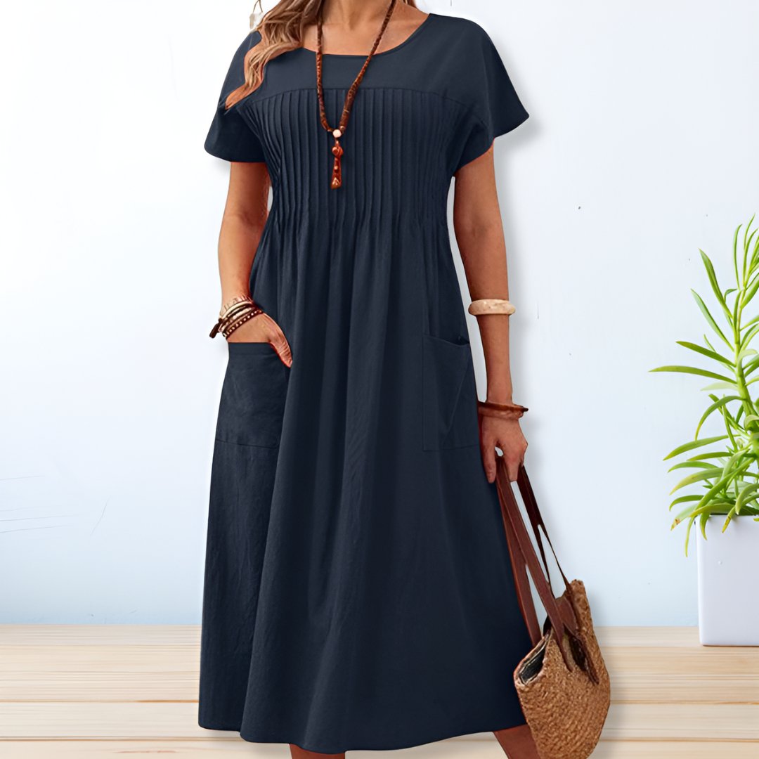 Comfortable women's casual midi dress, relaxed fit, great for everyday wear. Ideal for summer and spring fashion.