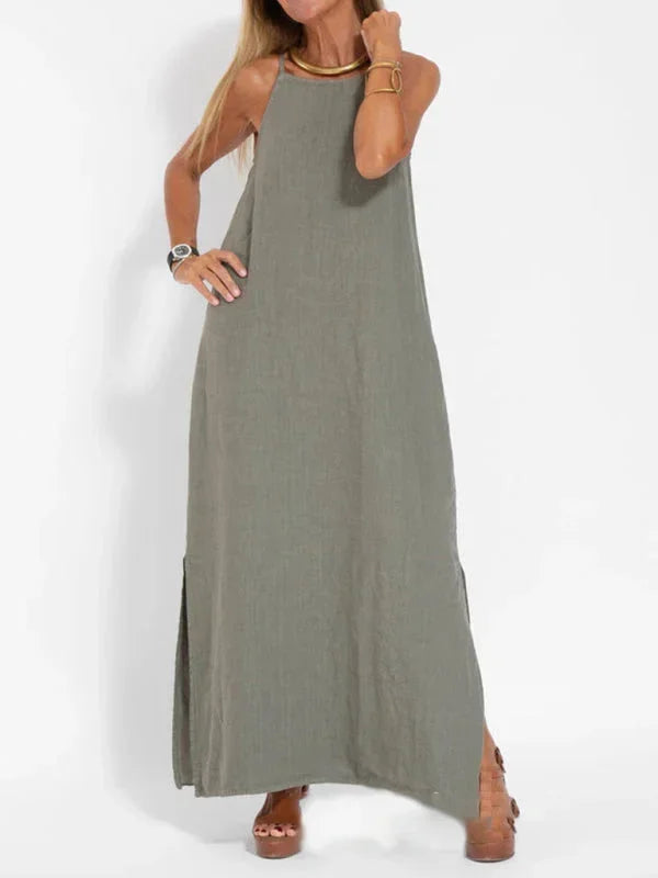 Women's casual sleeveless maxi dress with a stylish side slit, perfect for summer & vacation wear.