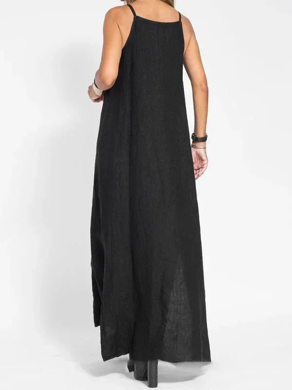 Comfortable women's maxi dress, sleeveless with a flattering side slit, ideal for casual summer outings.