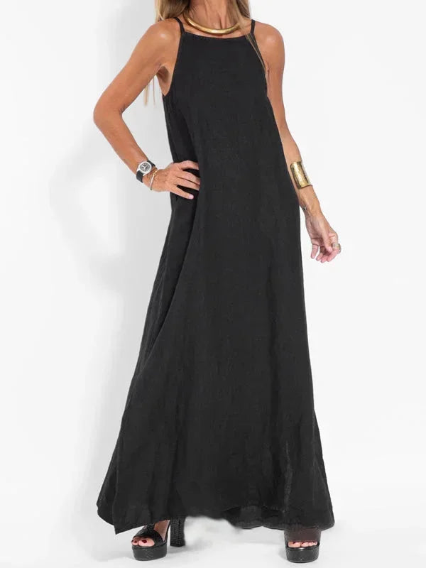 Relaxed fit sleeveless maxi dress for women, featuring a side slit, great for comfortable everyday wear.