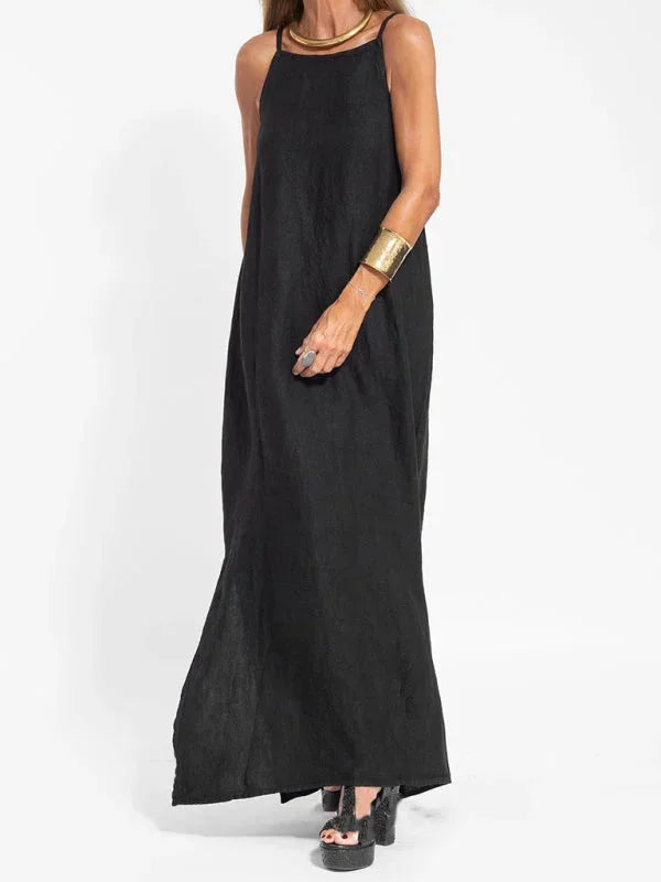 Women's stylish sleeveless maxi dress, casual & flowy with a side slit, suitable for summer fashion.