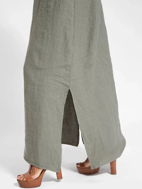 Comfortable sleeveless flowy maxi dress with side slit, great for everyday casual wear & spring fashion.