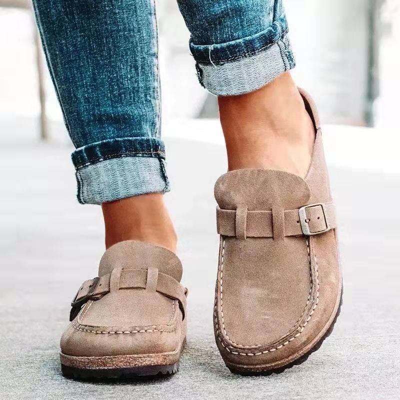 Everyday comfort: Women's slip-on loafers with a prominent buckle, great for casual wear.