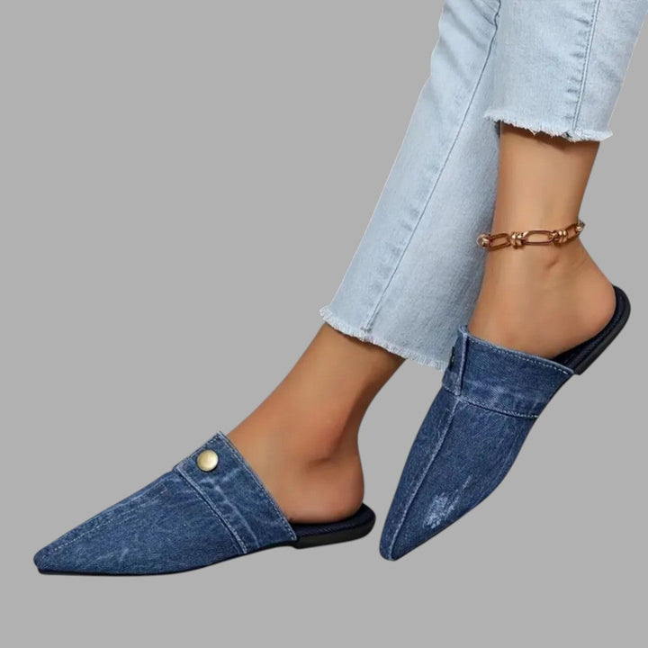 Fashionable women's slip-on mule sandals, offering comfort and style for casual summer footwear.
